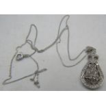 A 9ct white gold pear shaped pendant encrusted with diamonds on a fine white metal chain, clasp