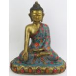 A large Chinese cloisonné and gilt metal seated Buddha, 20th century. Depicted seated on a lotus