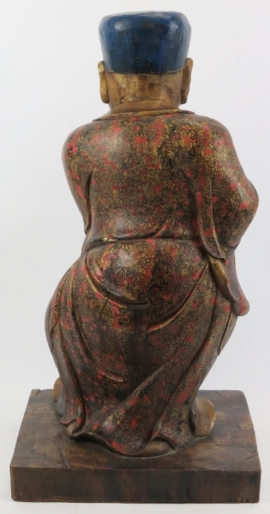 A Chinese gilt and lacquer painted carved wood figure, 20th century. Supported on a rectangular wood - Image 6 of 7