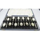 A set of 12 coffee spoons with bamboo pattern decorated handles, London 1963. Approx weight 7.8 troy