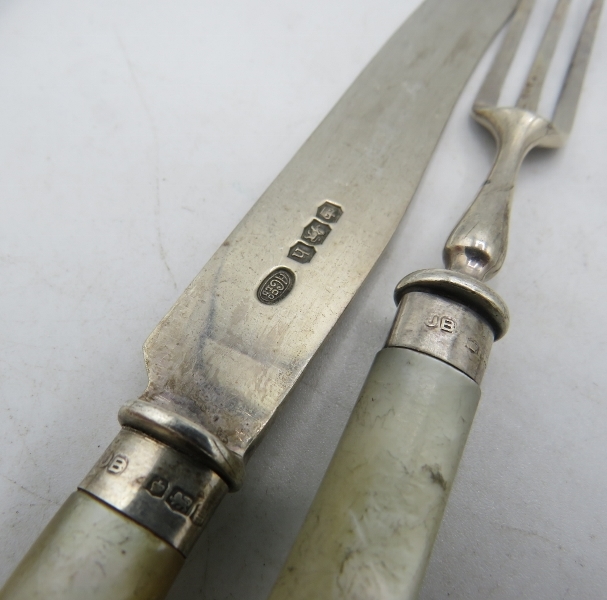 A set of four silver & mother of pearl fruit knives and forks, Sheffield 1925. Condition report: Age - Image 2 of 2