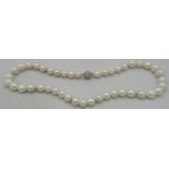 An exceptionally rare strand of soft white Australian Southsea pearls with rose undertones and 8