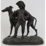 A bronzed spelter statue of a boy with greyhound, probably 19th century. 7.8 in (19.8 cm) length.