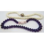 A fine amethyst rose quartz individually knotted necklace. The faceted amethyst approx 15mm x 10mm
