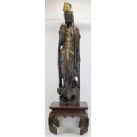 A large European painted cast plaster figure of Guanyin, late 20th century. Supported on a Chinese