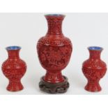 Three Chinese cinnabar lacquer vases. Comprising pair of cinnabar vases together with a larger