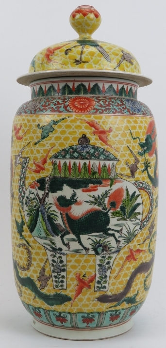 A Chinese famille verte rouleau vase and cover, 20th century. Decorated with dragons, cranes and