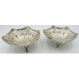 A pair of silver hexagonal bon bon dishes with pierced decoration & splayed feet, Birmingham 1914.