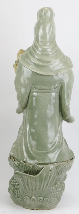 A large Chinese celadon glazed porcelain figure of Guanyin, 20th century. Depicted standing - Image 2 of 4