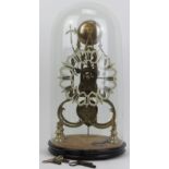 A brass skeleton clock with domed glass cover, 19th century. Fusee movement. Keys and pendulum