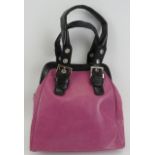 A Cosettini mauve with black trim handbag, with dust bag. Provenance: Part of a private collection