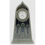 A Moorcroft Peacock Parade pattern clock. 5 in (12.6 cm) height, 9 in (22.8 cm) width. Condition