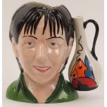 A Lorna Bailey limited edition ceramic character jug. Self modelled as Lorna Bailey, limited edition