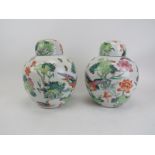 A pair of Chinese ginger jars, 20th century. 10.2 in (26 cm) height. Condition report: Good