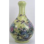 A very large Chinese onion necked baluster vase, 20th century. Florally decorated with birds against