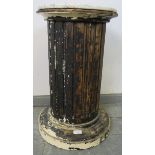 A vintage oak torchere in the form of a Corinthian column with faux marble loose top, on a stepped