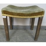 A George VI coronation stool in unrestored condition, upholstered in green velvet with gold braid