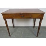 A late Georgian mahogany side table, the single drawer with pressed brass handle, on tapering turned