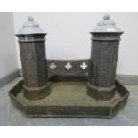 A very large 19th century cast iron boot scraper, the two octagonal columns with ball finials,