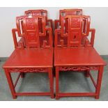 Four early 20th century Chinese chairs in cinnabar red lacquer with gold accents, on square supports