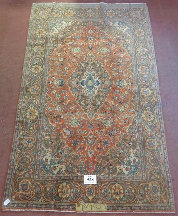 A signed Persian Kashan carpet with central motif on burnt amber field. In good condition. 225 x - Image 2 of 3