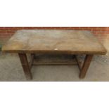 A substantial 19th century elm kitchen/pantry table on chamfered square end supports with