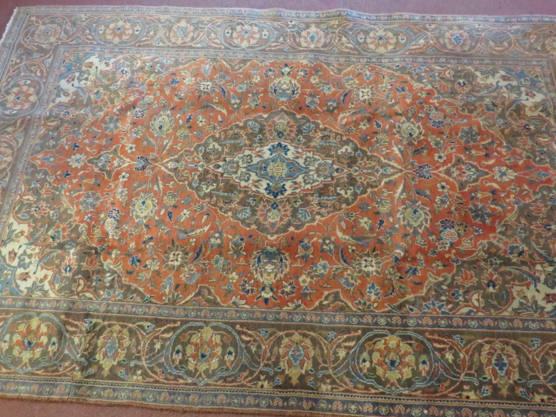 A signed Persian Kashan carpet with central motif on burnt amber field. In good condition. 225 x - Image 3 of 3