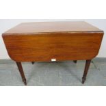 A 19th century mahogany Pembroke table with reeded edge, housing one single drawer and one dummy