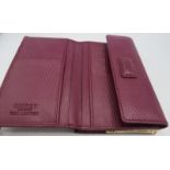 Osprey, London, leather maroon wallet/purse, boxed. Provenance: Part of a private collection of