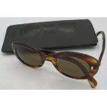 Cutler & Gross brown tortoiseshell sunglasses, cased. Provenance: Part of a private collection of