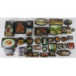 Collection of thirty six Russian lacquer papier Mache boxes, hair slides, brooches, some signed. (36