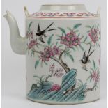 A Chinese famille rose teapot, 19th century. Finely overglaze enamel painted depicting birds amongst