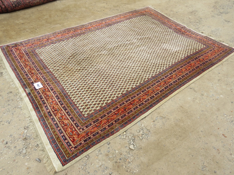 A 20th century Persian rug with central block pattern on cream ground. Condition and colour good. - Image 3 of 3