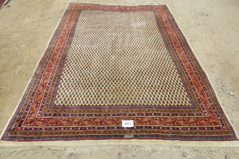 A 20th century Persian rug with central block pattern on cream ground. Condition and colour good. - Image 2 of 3