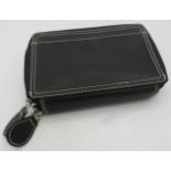 An Osprey, London, black wallet. Provenance: Part of a private collection of designer luxury goods