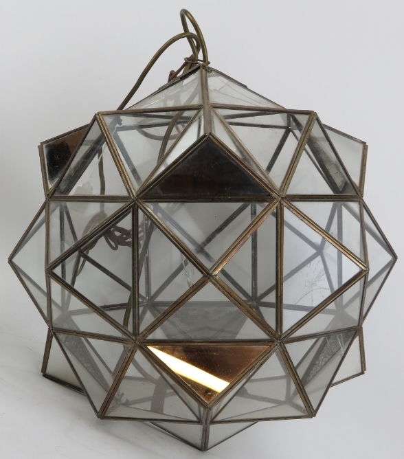 A large multifaceted glass polyhedron ceiling light, 20th century. Composed of clear and mirrored