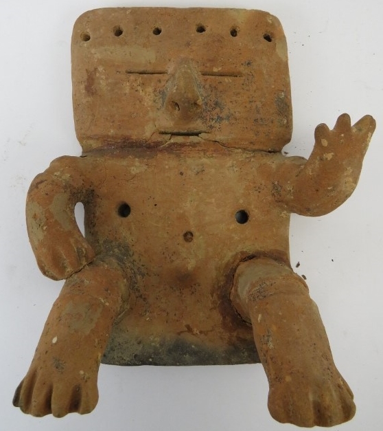 A pre Columbian Quimbaya terracotta slab figure believed to date to c.1000-1500 AD. These Alter