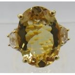 Citrine cocktail ring, large oval faceted 18mm x 13mm solitaire of good cut, colour and clarity,