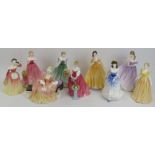 A group of nine Royal Doulton figurines. Comprising Reverie HN 2306, Michelle HN 4158, Elizabeth