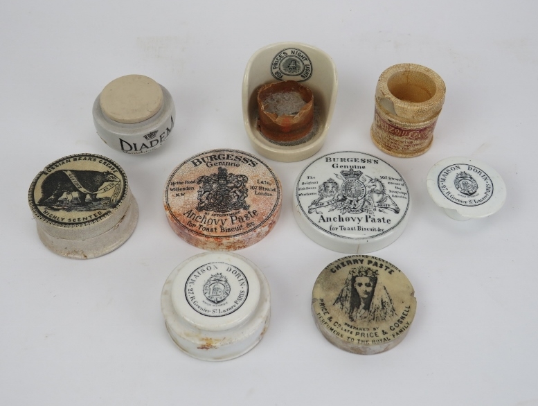 A collection of Victorian pot and printed lids. (9 items) 3.4 in (8.7 cm) largest diameter.