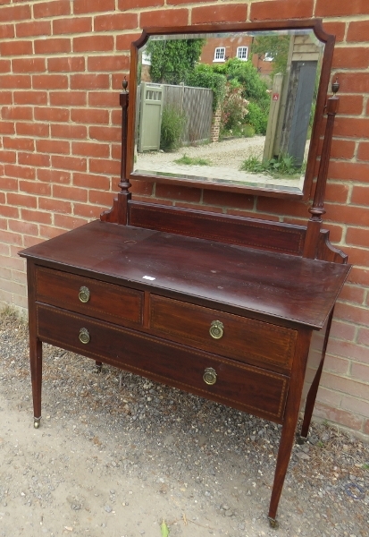 A good quality Edwardian Regency Revival mahogany dressing table, inlaid with walnut and ebony,
