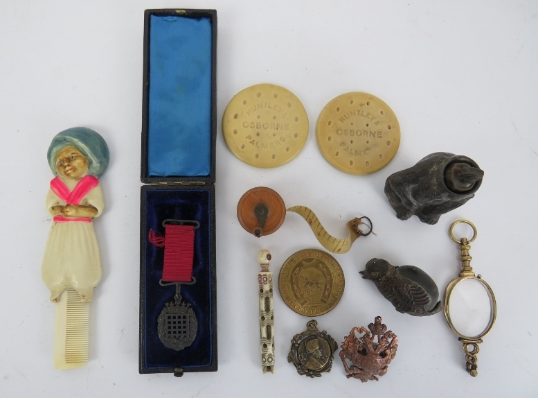 A group of antique and vintage miscellaneous items. Notable items include a carved bone Stanhope,