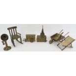 A collection of brass and copper miniature and mechanical music objects. Comprising a brass