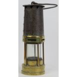 A brass miners lamp, 19th/early 20th century. 10.2 in (26 cm) height. Condition report: Wear with