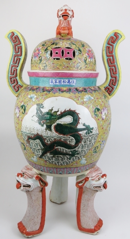 A very large Chinese Famille rose porcelain tripod censor and cover. Of ding form, the pierced domed