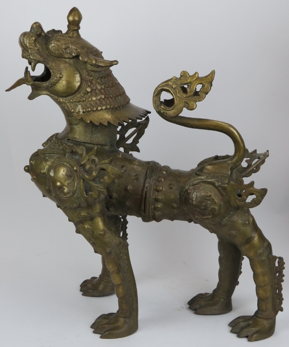 A large pair of Chinese bronze armoured dogs. (2 items) 22.8 in (58 cm) height. Condition report: - Image 3 of 4