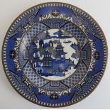 A Chinese cloisonné enamelled Willow pattern dish, 20th century. Finely detailed decoration in