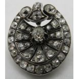 A fine early Victorian silver & gold diamond brooch of pierced palmette design, set throughout