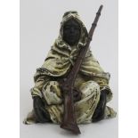 An Austrian style cold painted bronze figure of an Arab with musket.