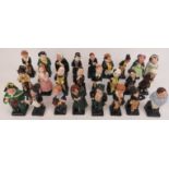 A large collection of Royal Doulton Charles Dickens character figurines. (25 items). Condition